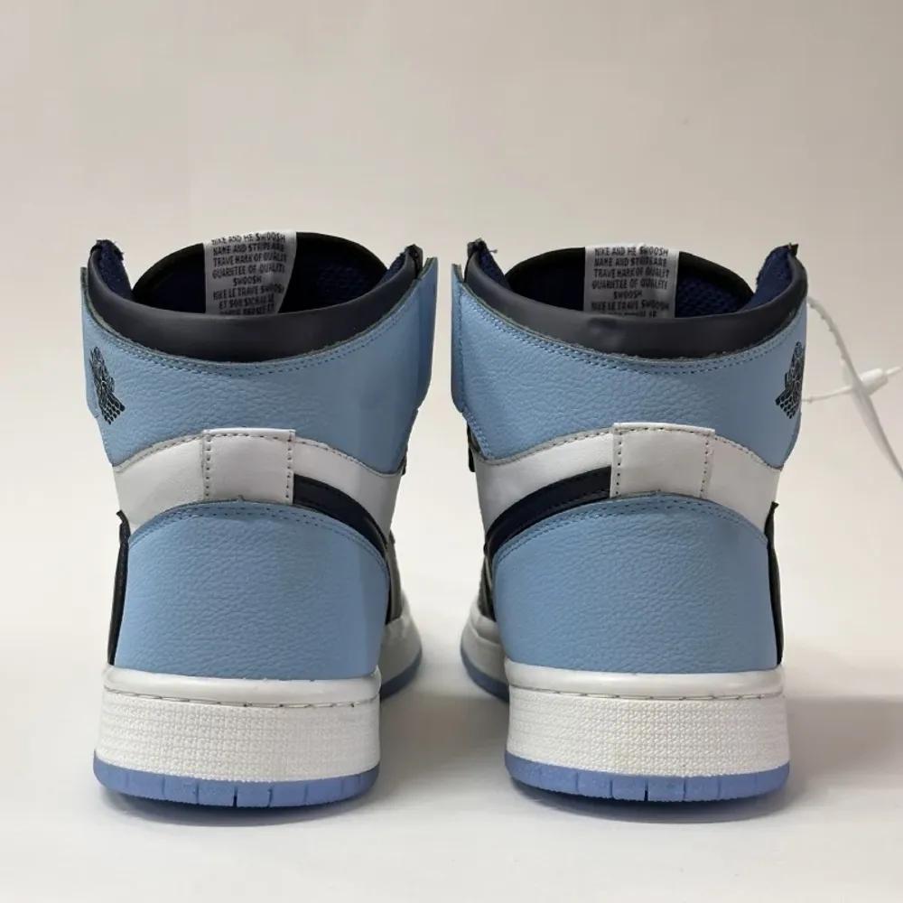 خرید اینترنتی قیمت کتونی نایک ایر جردن 1 های سفید سرمه‌ای | Air Jordan 1 High University Blue