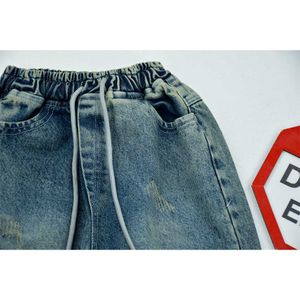 خرید اینترنتی قیمت شلوار جین مام فیت پسرانه آبی 5 تا 12 سال کد 11421