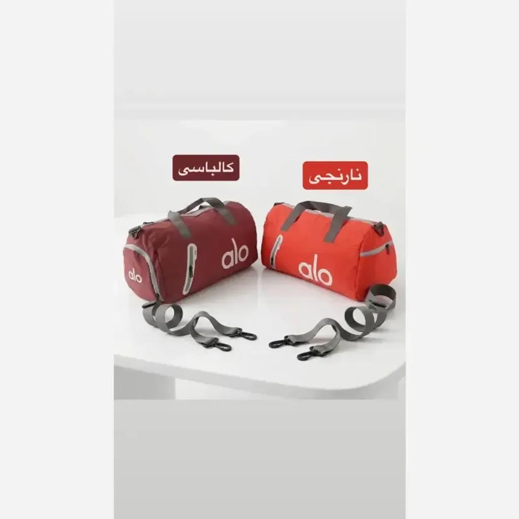 خرید اینترنتی قیمت ساک ورزشی و مسافرتی پارچه ای سه بند با جیب بیرونی و زیپ