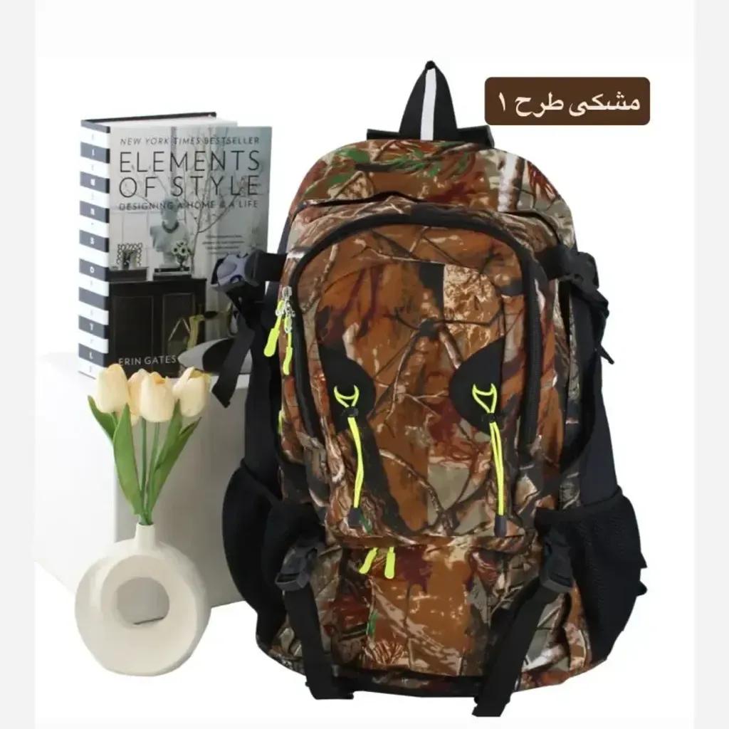 خرید اینترنتی قیمت کوله پشتی مسافرتی و ورزشی پارچه ای چهار جیب بیرونی