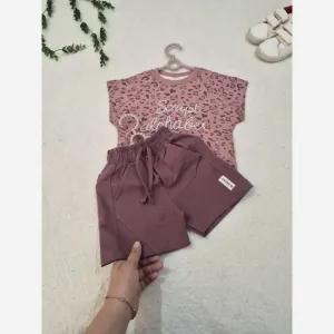 خرید اینترنتی قیمت ست تیشرت و شلوارک دخترانه طرح پلنگی پنبه لاکرا سایز 35 تا 50