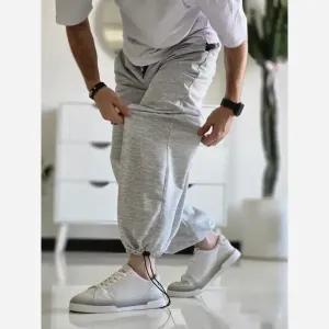 خرید اینترنتی قیمت جاگر کلوین کلین اسلش ملانژ دمپا گت دار مناسب آقا و خانم سایز XXL و XXXL طوسی مشکی برفی
