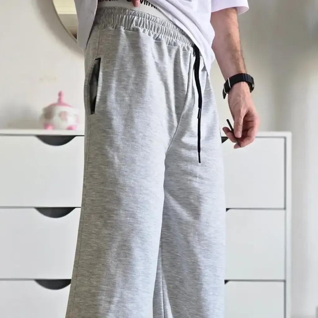 خرید اینترنتی قیمت جاگر کلوین کلین اسلش ملانژ دمپا گت دار مناسب آقا و خانم سایز XXL و XXXL طوسی مشکی برفی