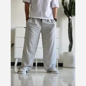 خرید اینترنتی قیمت جاگر کلوین کلین اسلش ملانژ دمپا گت دار مناسب آقا و خانم سایز XXL و XXXL طوسی مشکی برفی