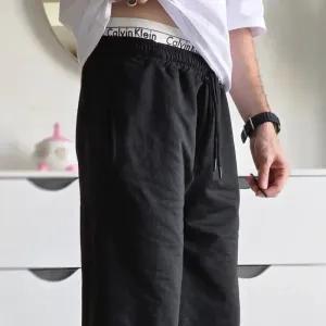 خرید اینترنتی قیمت جاگر کلوین کلین اسلش ملانژ دمپا گت دار مناسب آقا و خانم سایز XXL و XXXL طوسی مشکی برفی