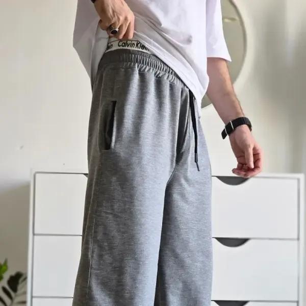 جاگر کلوین کلین اسلش ملانژ دمپا گت دار مناسب آقا و خانم سایز XXL و XXXL طوسی مشکی برفی