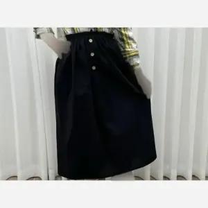 خرید اینترنتی قیمت دامن لنین جلو جیب فری سایز مناسب تا سایز 48