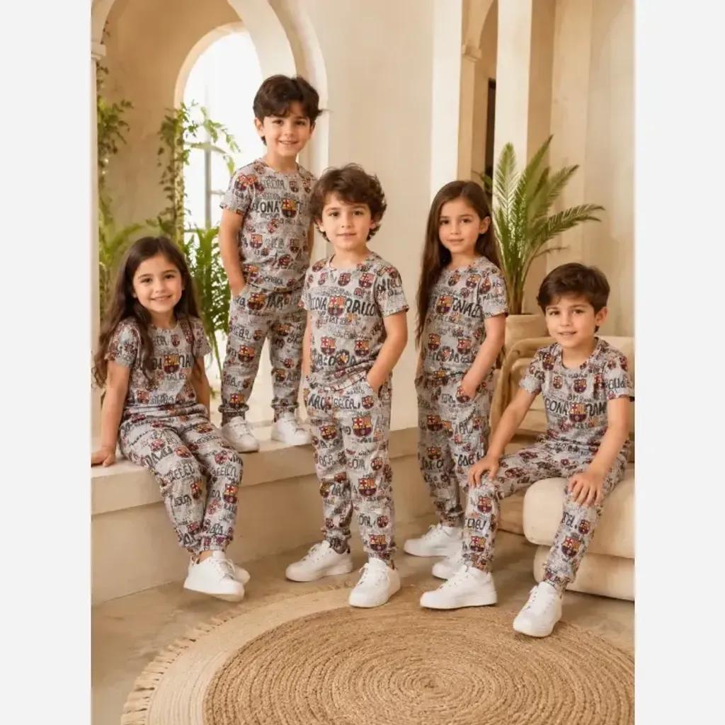خرید اینترنتی قیمت ست تیشرت و شلوار راحتی پسرانه طرح رئال مادرید جنس کبریتی پنبهای سایز 7 و 8 سال