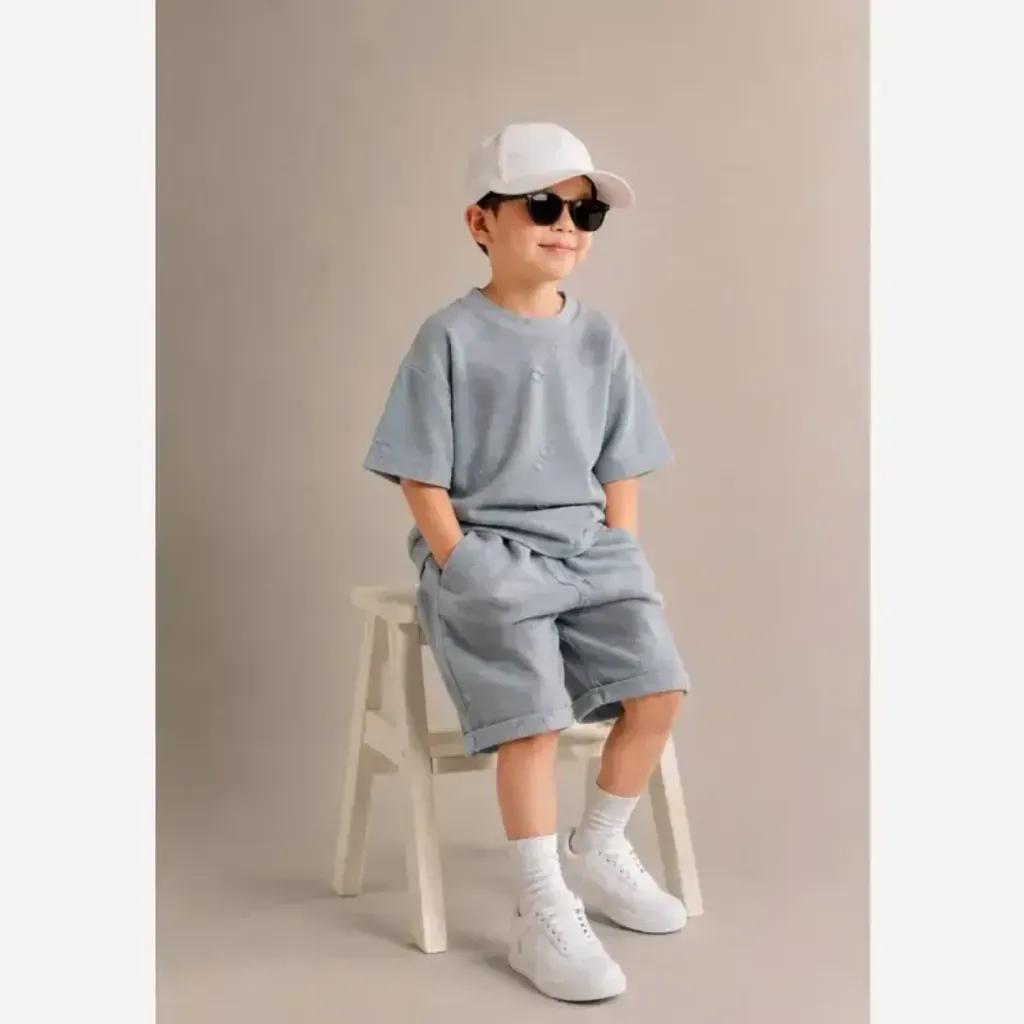 خرید اینترنتی قیمت ست بلوز و شلوارک بچگانه طرح زاپ دار نخ و پنبه نرم و سبک مناسب 1 تا 7 سال