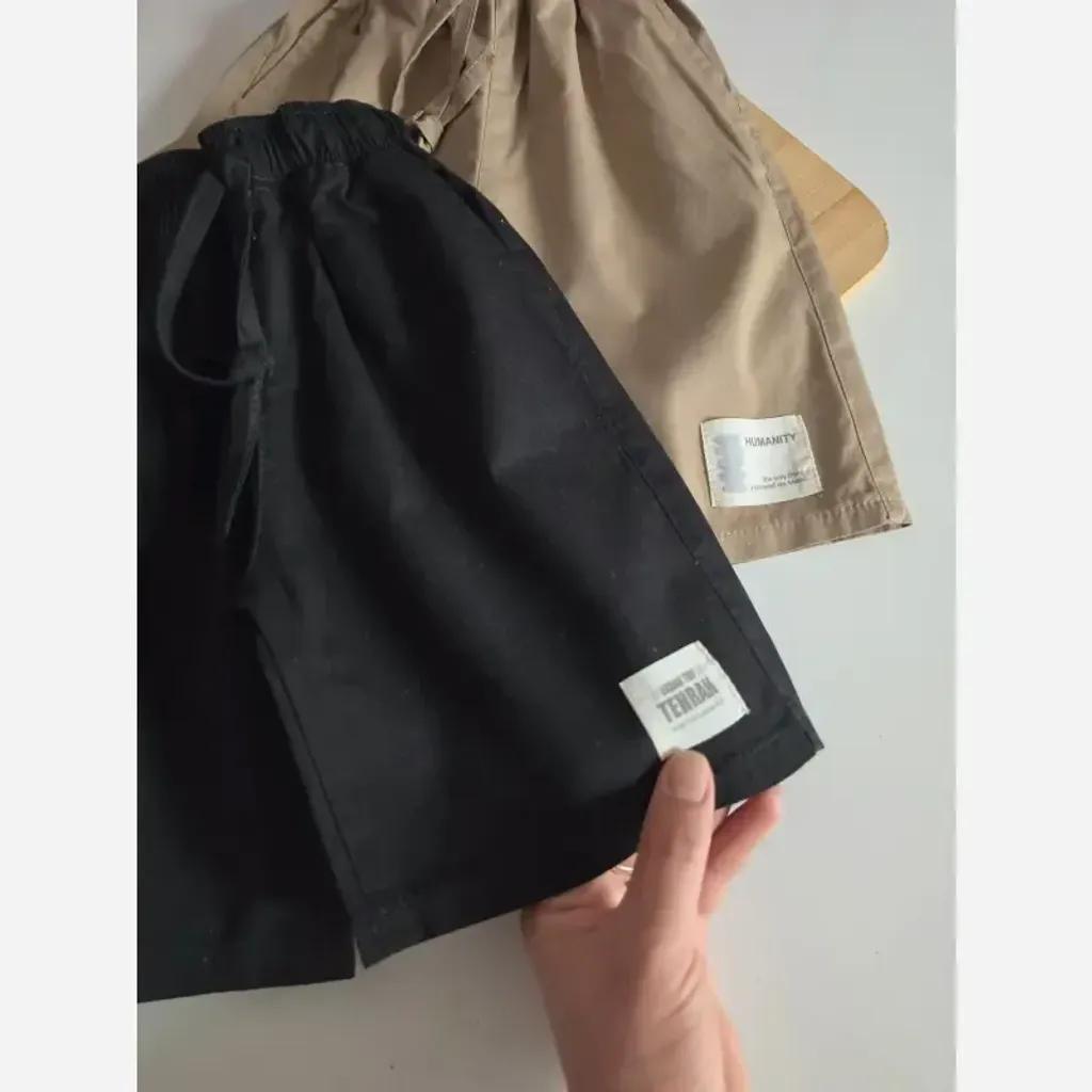 خرید اینترنتی قیمت شلوارک کتان لش پسرانه زیر زانو سایز 3 تا 10 سال مشکی و نسکافه ای