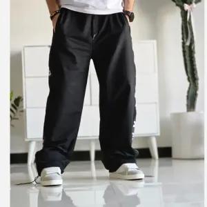 خرید اینترنتی قیمت شلوار اسلش بگ جردن مشکی گلکسی اسپان قد 108 سایز XXL XXXL