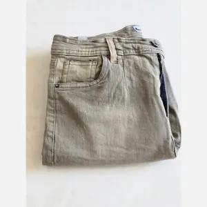 خرید اینترنتی قیمت شلوار لی دمپا زیپ مردانه تمام کش سایز 40 تا 48 پارچه پر دمپا کش