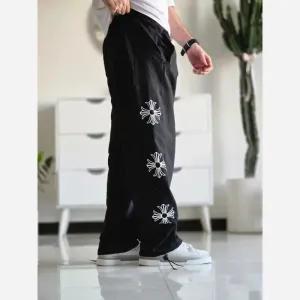 شلوار اسلش بگ کروم هارتز رنگ مشکی جنس گلکسی اسپان سایز XXL و XXXL