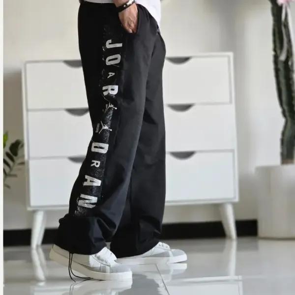 شلوار اسلش بگ جردن دمپا گت دار رنگ مشکی پارچه گلکسی اسپان سایز XXL XXXL
