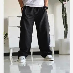 خرید اینترنتی قیمت شلوار اسلش بگ جردن دمپا گت دار رنگ مشکی پارچه گلکسی اسپان سایز XXL XXXL