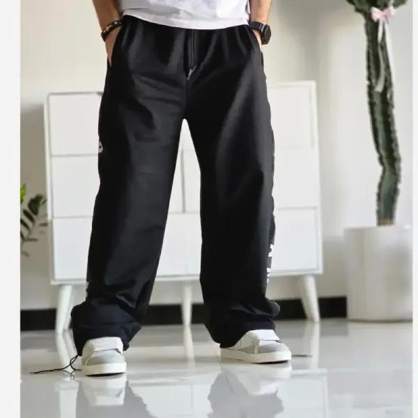 شلوار اسلش بگ جردن دمپا گت دار رنگ مشکی پارچه گلکسی اسپان سایز XXL XXXL