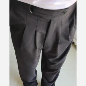 خرید اینترنتی قیمت شلوار بگ پارچه ای کجراه مشکی کمر ایتالیایی سایز L تا 3XL