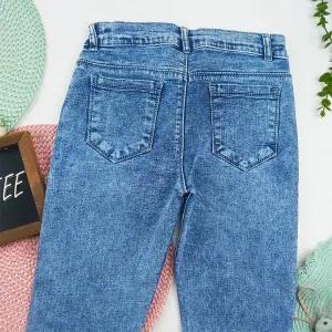 خرید اینترنتی قیمت شلوار جین دخترانه مدل برفکی جذب مناسب 11 تا 13 سال