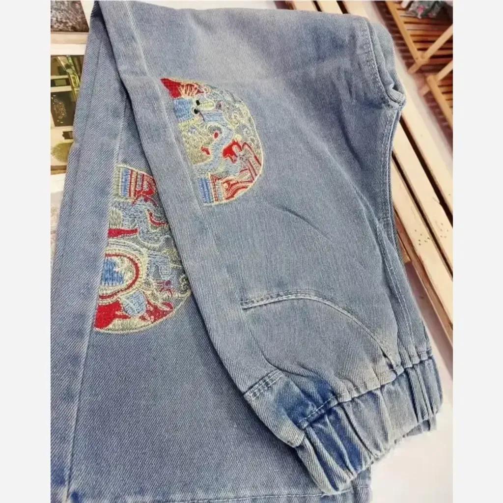 خرید اینترنتی قیمت شلوار بگ جین دخترانه گلدوزی شده سایز 130 مناسب 6 تا 8 سال وارداتی