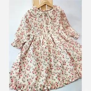 خرید اینترنتی قیمت پیراهن دخترانه لینن وارداتی طرح گل مناسب 2 تا 8 سال