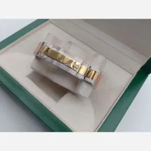 خرید اینترنتی قیمت ساعت مچی مردانه رولکس دیتونا دورنگ طلایی صفحه آبی با موتور ژاپن و کرنوگراف فعال