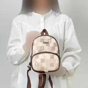 خرید اینترنتی قیمت مینی کوله طرح دار زنانه چرم مصنوعی