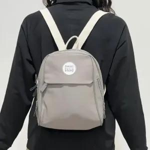 خرید اینترنتی قیمت کوله فانتزی دخترانه نانسی خارجی مشکی نسکافه متوسط 30*25 کلاس روزمره سرکار