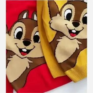 خرید اینترنتی قیمت گپ بافت بچگانه طرح سنجاب مناسب 2 تا 9 سال