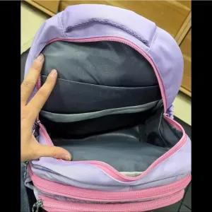 خرید اینترنتی قیمت کوله پشتی مدرسه دخترانه ضد آب پارچه ریپس وارداتی مناسب کلاس اول تا چهارم