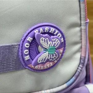 خرید اینترنتی قیمت کوله پشتی مدرسه دخترانه ضد آب پارچه ریپس وارداتی مناسب کلاس اول تا چهارم