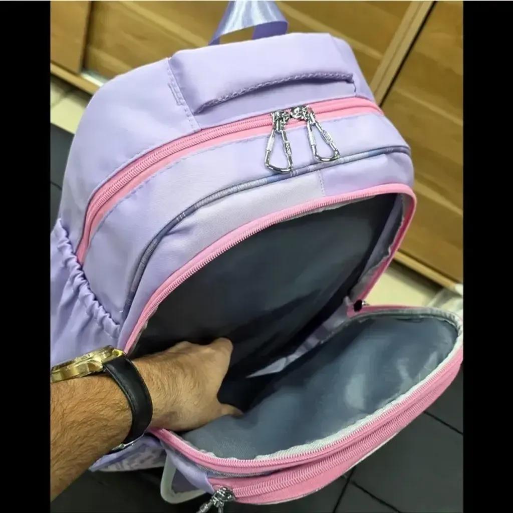 خرید اینترنتی قیمت کوله پشتی مدرسه دخترانه ضد آب پارچه ریپس وارداتی مناسب کلاس اول تا چهارم