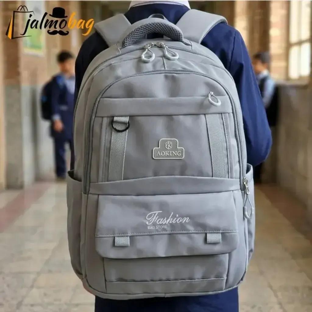 خرید اینترنتی قیمت کوله پشتی اسپرت سبک پارچه کجراه خارجی ضد تعریق مناسب سوم ابتدایی به بالا