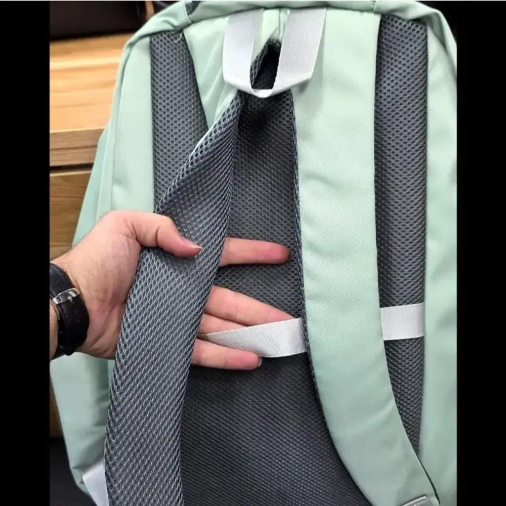 خرید اینترنتی قیمت کوله پشتی اسپرت سبک پارچه کجراه خارجی ضد تعریق مناسب سوم ابتدایی به بالا