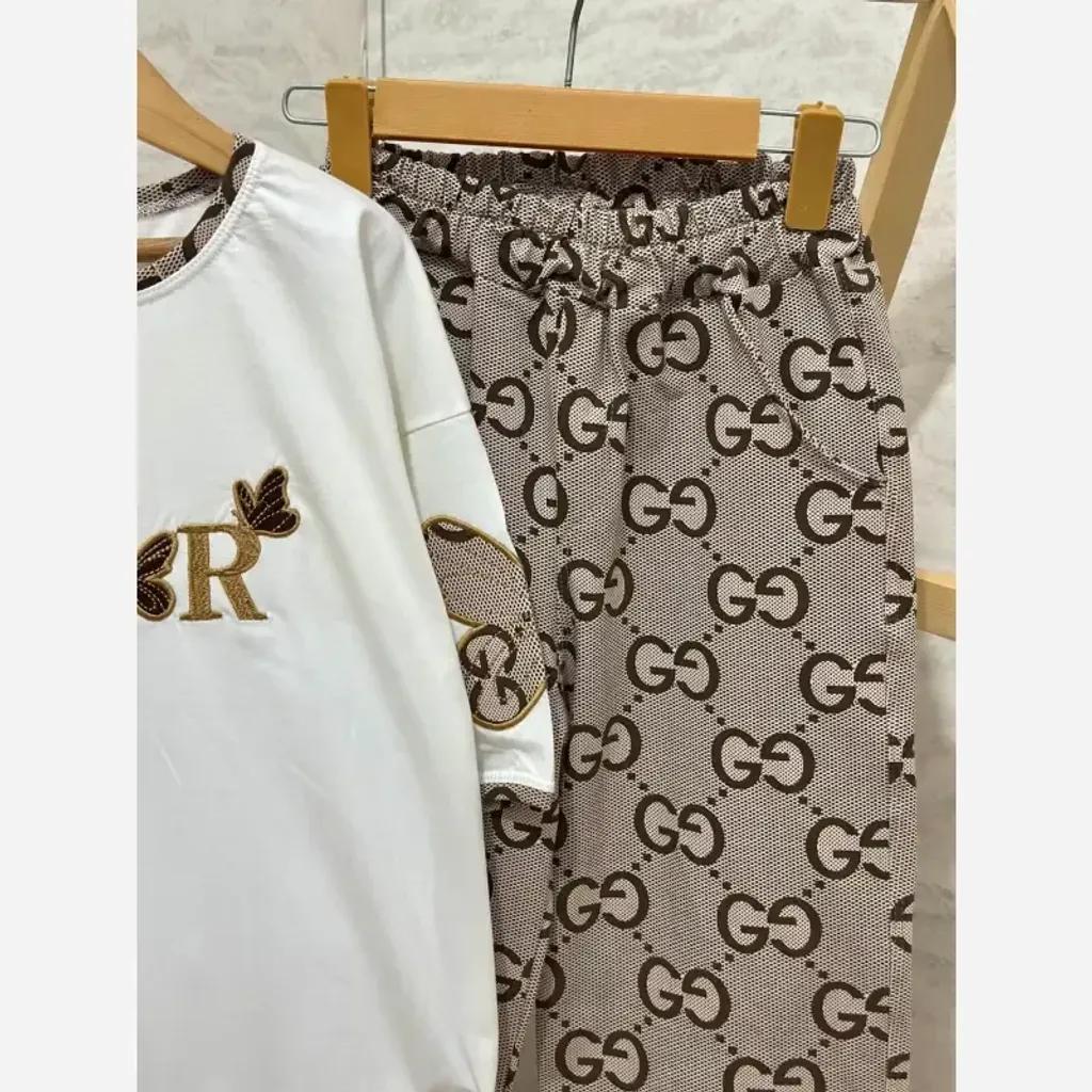 خرید اینترنتی قیمت ست تیشرت و شلوار دخترانه مدل پروانه پنبه دورس سایز 60 تا 70 مناسب 10 تا 18 سال