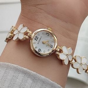 خرید اینترنتی ساعت زنانه دخترانه بابونه با بند استیل رنگ ثابت