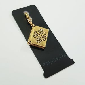 خرید اینترنتی آویز چند کاره طلایی طرح کتاب ، با برگه های سفید قابل نوشتن ، برند Pilgrim