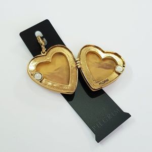 فروش اینترنتی آویز چند کاره لاکت قلبی کار شده با چوب ، از برند Pilgrim