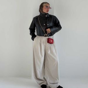 فروش اینترنتی کت چرم دکمه پانچی کد 120458