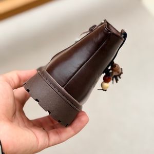 خرید اینترنتی قیمت بوت بچگانه چرمی طرح min منگوله از murche کد 5070601