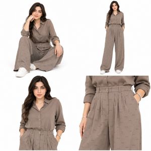 خرید اینترنتی قیمت شلوار زنانه فول بگ کرپ ریزشی طرح miu miu