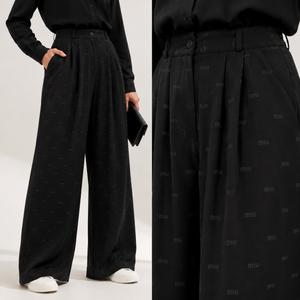 خرید اینترنتی قیمت شلوار زنانه فول بگ کرپ ریزشی طرح miu miu