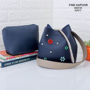 خرید اینترنتی قیمت کیف زنانه چرمی گل برجسته وارداتی