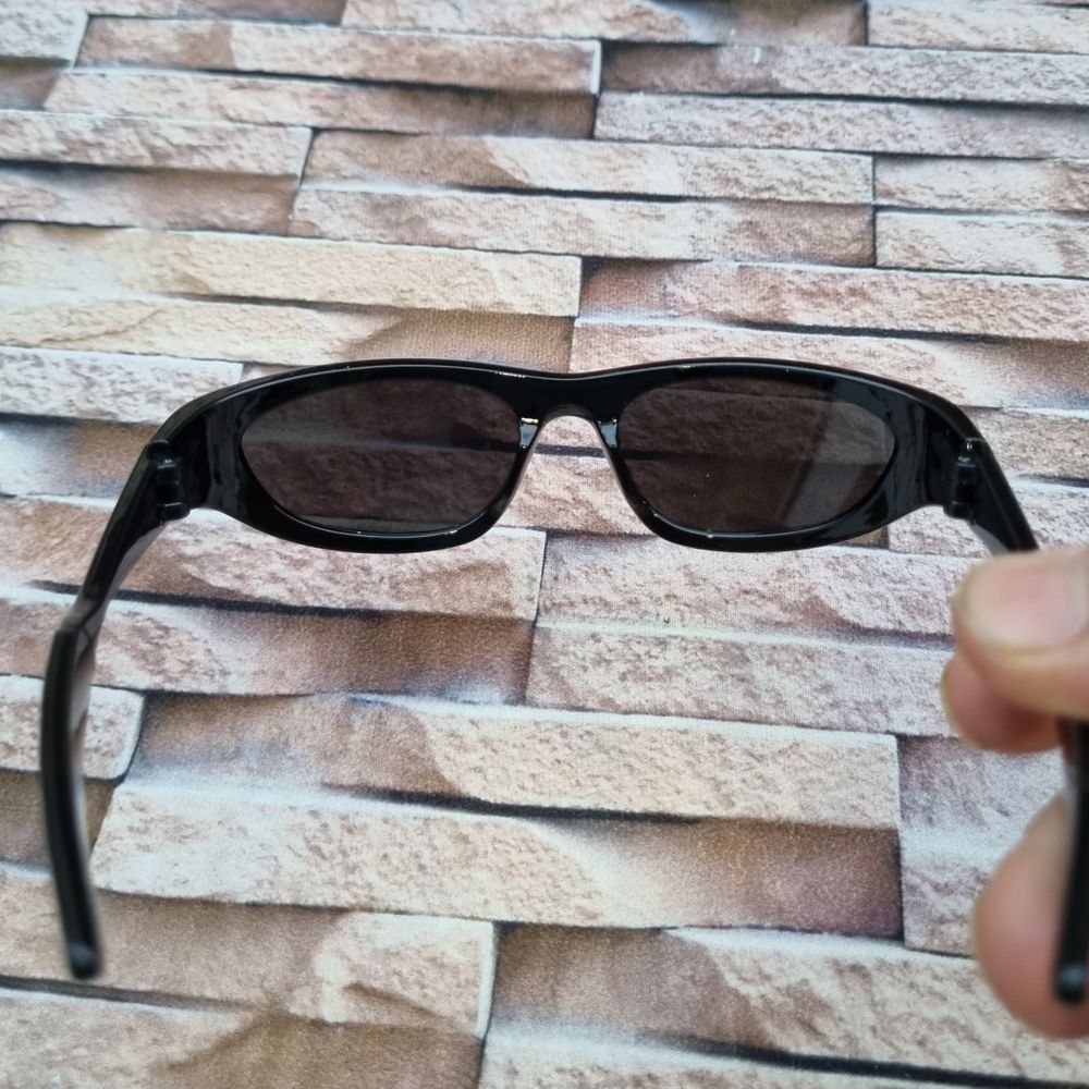 خرید اینترنتی عینک آفتابی بچه گانه مدل بیضی مشکی عدسی نقره ای