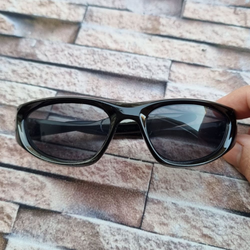 خرید انلاین عینک آفتابی بچه گانه مدل بیضی مشکی مشکی